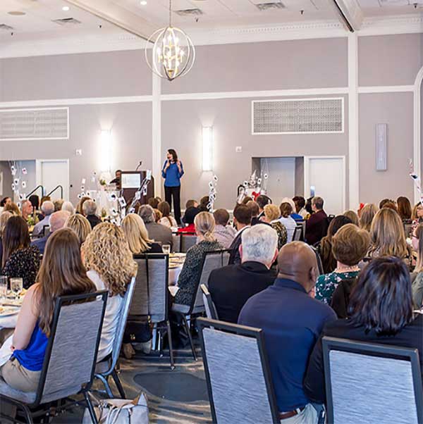 speaking-image Tambry Harris speaking to a group